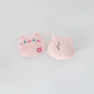 Detailed front and back view of plush pink cat brooches with exquisite embroidery