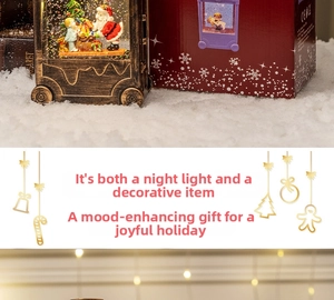 Detail of vintage Christmas snow globe lantern with Santa Claus and festive gift box