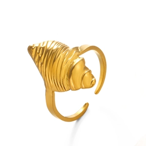 Chic golden conch shell ring with spiral texture for beach style and ocean vacation fashion