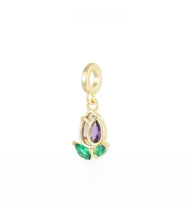 Detail of 18k gold tulip pendant with purple teardrop crystal and green gemstone leaves