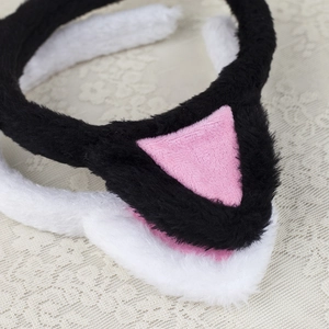 Cute plush cat ear headband for women with soft fur detail on beige lace background
