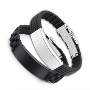 Detail of adjustable silicone bracelets with stainless steel plates and secure metal clasps