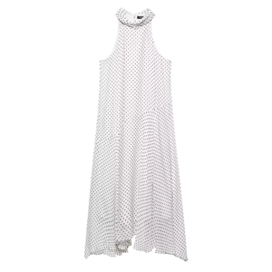 Detailed close-up of halter high neck with pleated collar on white polka dot dress