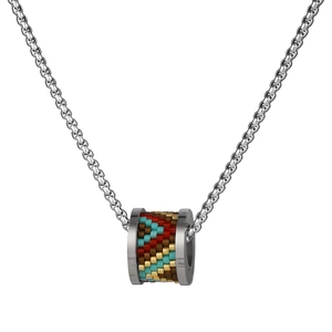Detailed macro view of a cylindrical pendant with colorful hand-woven glass seed beads
