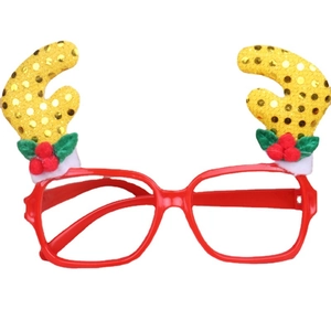 Red Christmas glasses frame with golden sequin reindeer antlers for holiday party decor