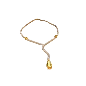 Elegant Y-shaped necklace with yellow teardrop crystals and gold metal setting