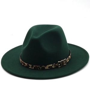 Detailed view of dark green wool fedora hat featuring a stylish leopard print leather band