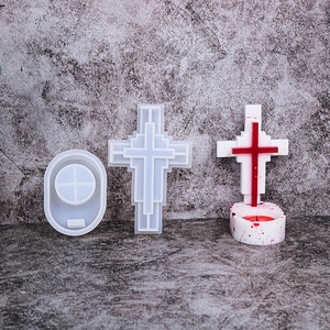 Macro detail of cross-shaped silicone mold set for DIY candles and handmade resin crafts