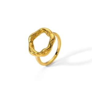 Macro shot of 18k gold plated stainless steel ring with irregular geometric texture