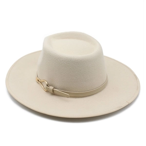 Detail of wide brim wool fedora featuring cream wool felt and gold metal buckle strap