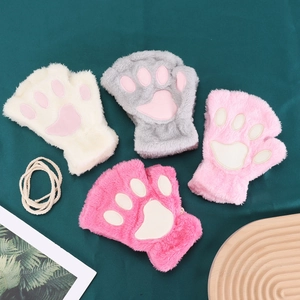 Detailed macro view of plush cat paw gloves in white, grey, pink and rose colors