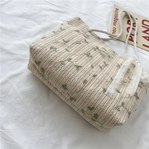 Summer straw tote bag with green leaf embroidery, lace trim and cotton rope handles