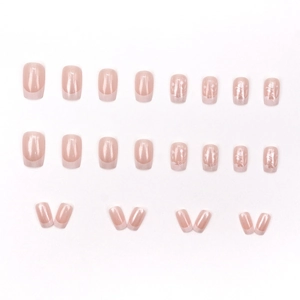 Set unghie finte press-on stile francese lilla perlato con punte a fiori bianchi