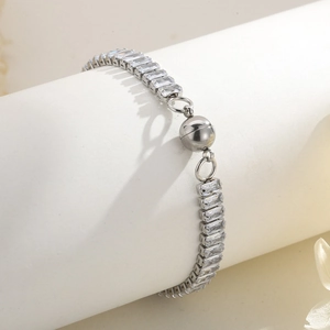Detailed shot of silver steel bracelet with square cubic zirconia and magnetic clasp