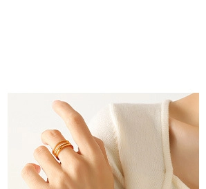 Close-up of three-layer 18K gold plated ring with zircon inlay on model's finger