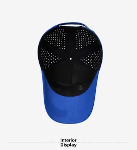 Detail view of breathable laser-cut holes and stitching inside the royal blue baseball cap
