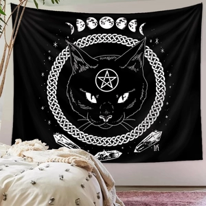 Detailed view of black cat and moon phase tapestry in a modern bedroom setting