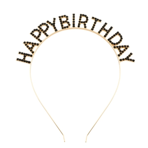 Detail of gold metal headband featuring black rhinestone HAPPY BIRTHDAY lettering