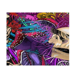 Macro detail of tapestry fabric showing colorful mushroom and tentacle print patterns