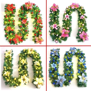 Detail of 2.7m Christmas garland with LED lights, colorful ornaments and festive flowers