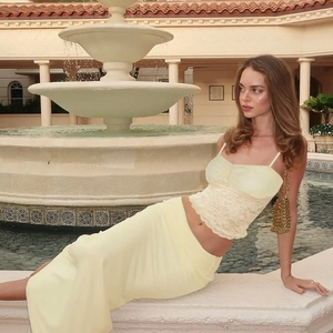 Elegant women's summer lace camisole and satin maxi skirt set in pale yellow hue