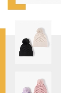 Detail of four knit beanies in black and beige with faux fur pom and textured scales
