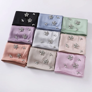 Nine colors of satin chiffon hijabs with handmade rhinestone flowers in grid layout