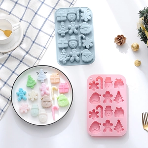 Christmas silicone molds for chocolate and candy featuring snowman and gingerbread man shapes