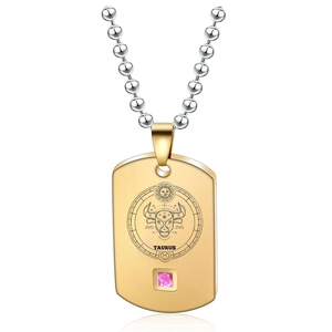 Polished gold Taurus zodiac dog tag necklace with a pink gemstone and silver ball chain