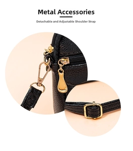 Close-up detail of women bag gold hardware, zipper, lobster clasp and adjustable strap buckle.