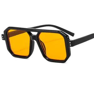 Retro oversized sunglasses with thick black frame and bright orange transparent lenses