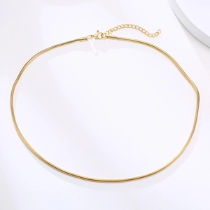 Detailed view of golden stainless steel snake chain necklace with lobster clasp closure