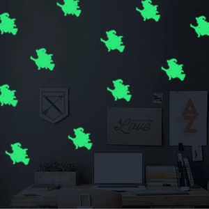 Luminous Halloween wall stickers featuring green glowing silhouettes of witches on broomsticks