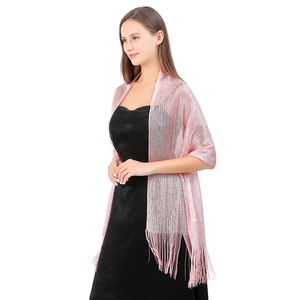 Detailed view of pink sparkling shawl with metallic thread and elegant fringe trim