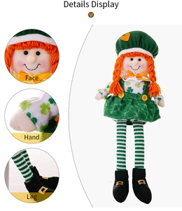 Close-up details of St. Patrick's Day plush doll with clover patterns and striped legs