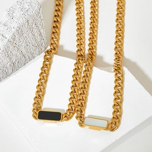 Gold stainless steel chunky Cuban chain necklace with black and white square pendants