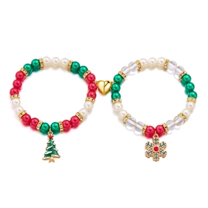 Christmas magnetic couple bracelets with festive beads, tree and snowflake charms