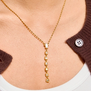 18K gold plated stainless steel Y-shaped necklace featuring geometric cubic zirconia drops