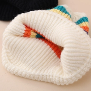 Cozy cream winter knit baby hat with colorful rainbow stripes and ear protection