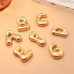 Golden puffy 3D letter charms for DIY necklaces featuring polished A B C E F G alphabet beads