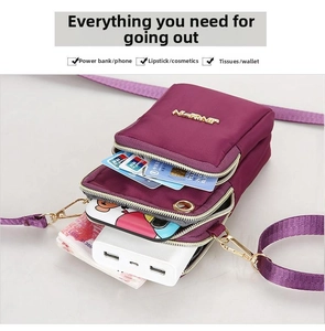 Detailed interior of nylon crossbody bag with multi-layer storage for phone and power bank