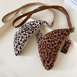 Leopard print croissant mini neck pouch set in two-tone faux leather finish