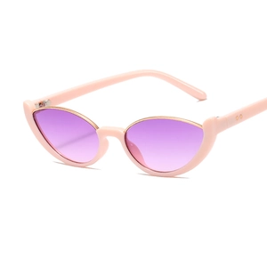 Pink cat eye sunglasses with purple gradient lenses and gold metal trim edge