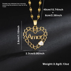 Gold-plated heart pendant necklace with Amor engraving and white zircon on black background