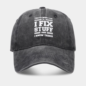 Vintage washed cotton baseball cap in charcoal gray with printed humorous quote text