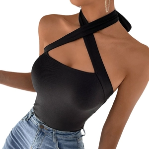 Slim fit black halter cross knit ribbed top for women paired with denim jeans
