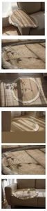 Detailed close-up of a round jute rug with elegant white cotton tassels on wooden floor