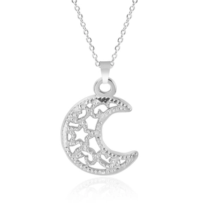 Macro shot of silver crescent moon pendant featuring intricate hollow star details