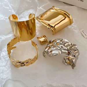 Polished gold and silver metallic chunky open cuff bracelets with crumpled texture design