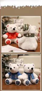 Detailed close-up of Christmas polar bear plush with Chinese style embroidery and scarf